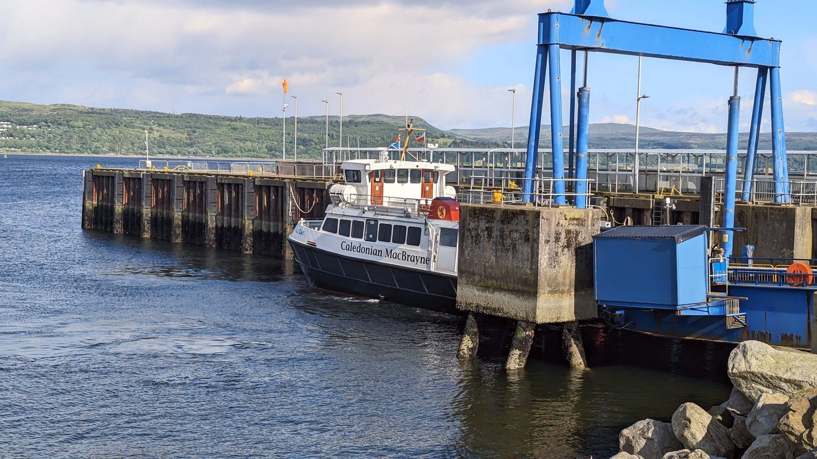 A Caledonian MacBrayne ferry berthed at the linkspan at Dunoon on the Firth of Clyde.